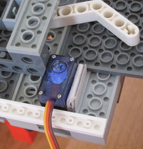 Servo packed tight with cardboard